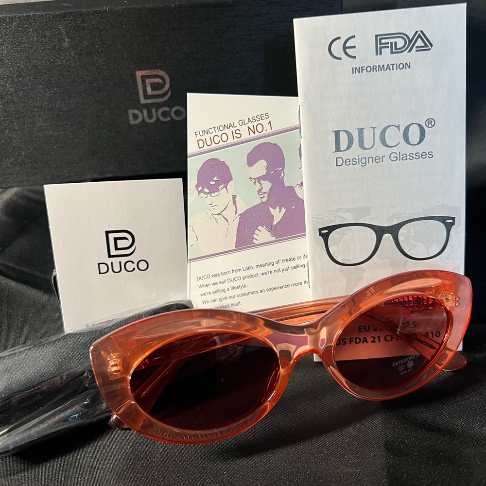 Duco Polarized Sun Glasses. New in Box